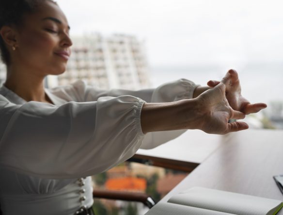 medium-shot-woman-stretching-work